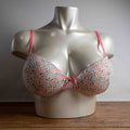 Royce white floral wire-free bra with pink straps and small pink bow detail.