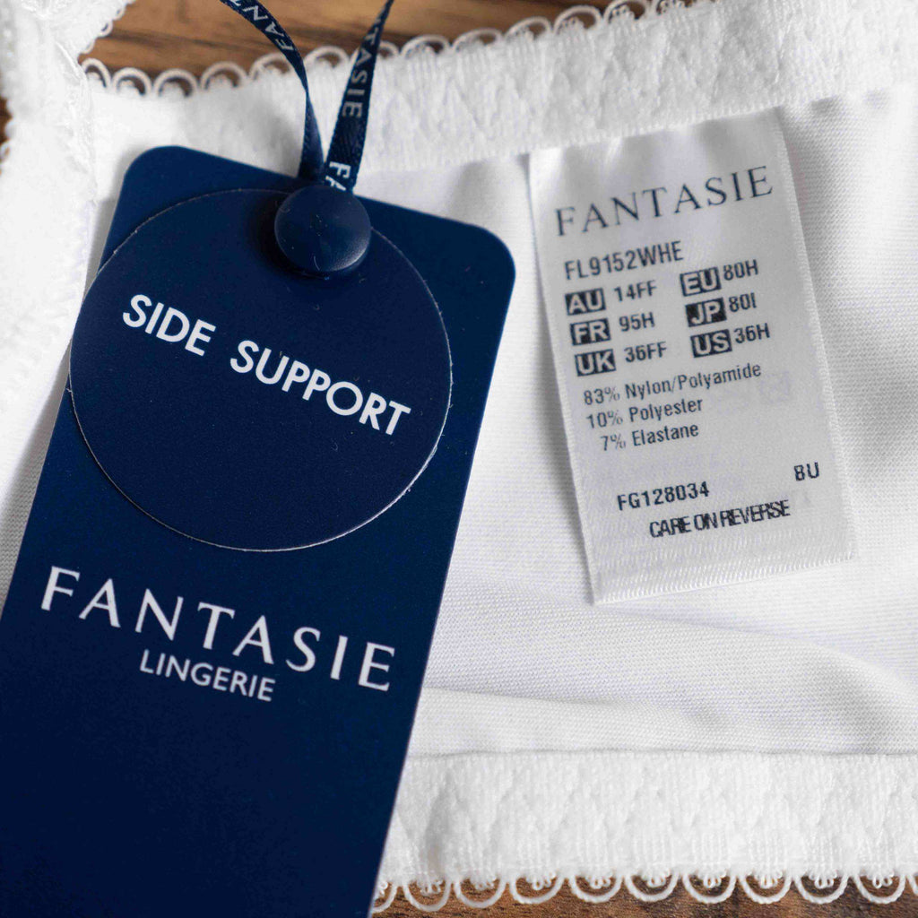 Fantasie white underwire bra with embroidered lace cups and adjustable straps.