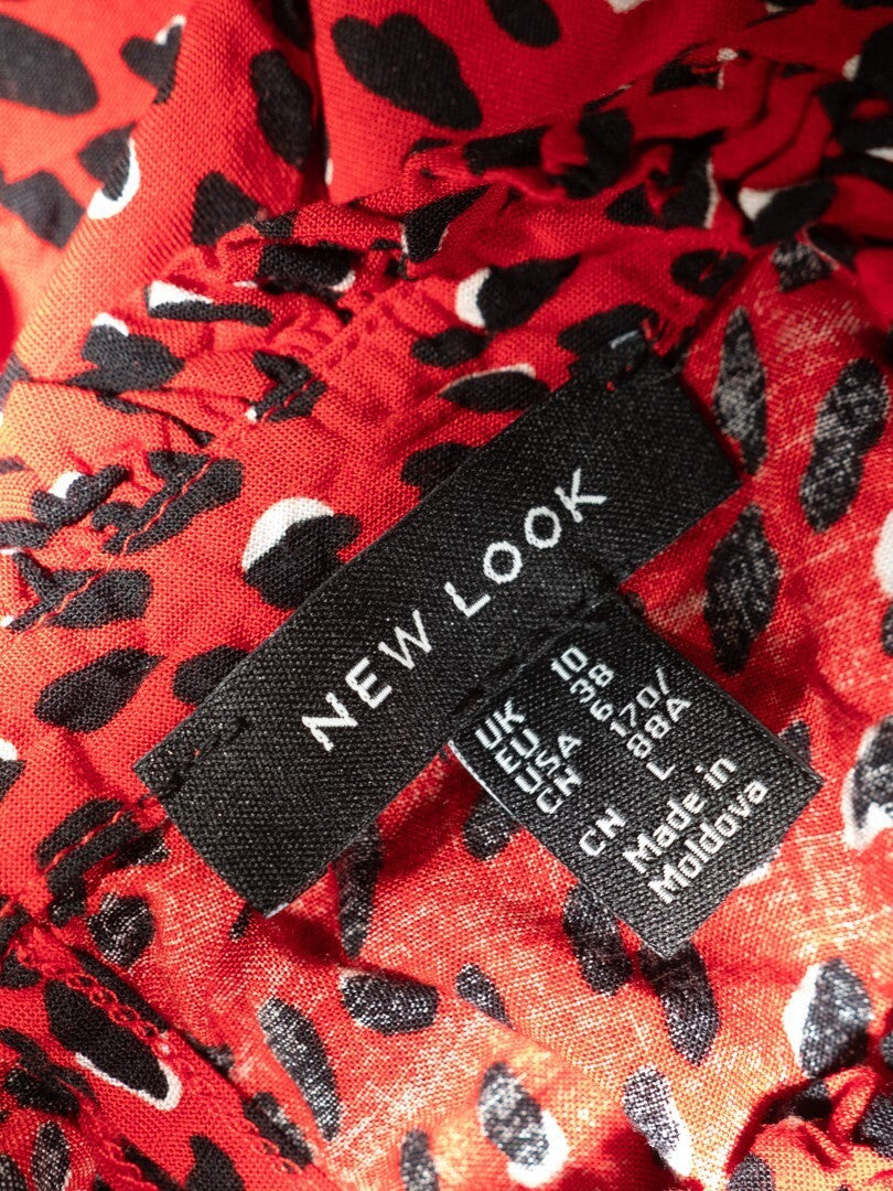 New Look red blouse with black accents, high neck, single button, 100% viscose.