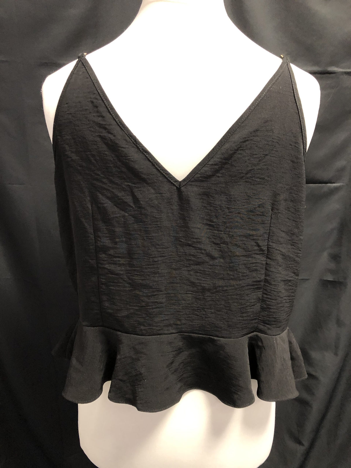 River Island black peplum cami top with button details and adjustable straps.