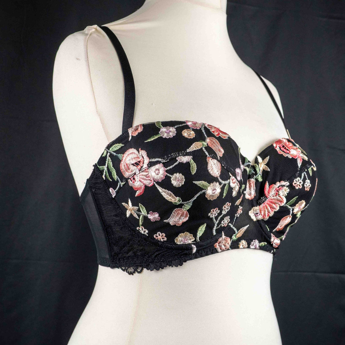 New Look black balconette bra with pink floral embroidery and decorative strappy back.