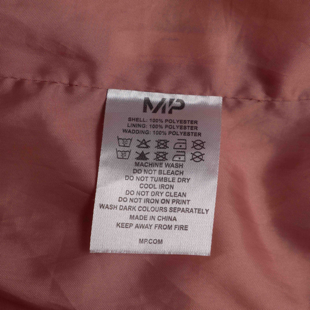 MP pink zip up puffer jacket with horizontal quilting and minimal logo on chest.