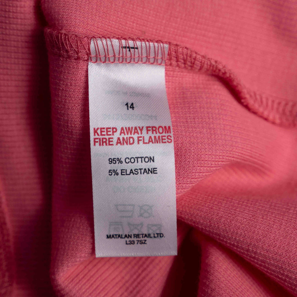 Papaya pink midi dress with ruffle sleeves and soft ribbed knit fabric.