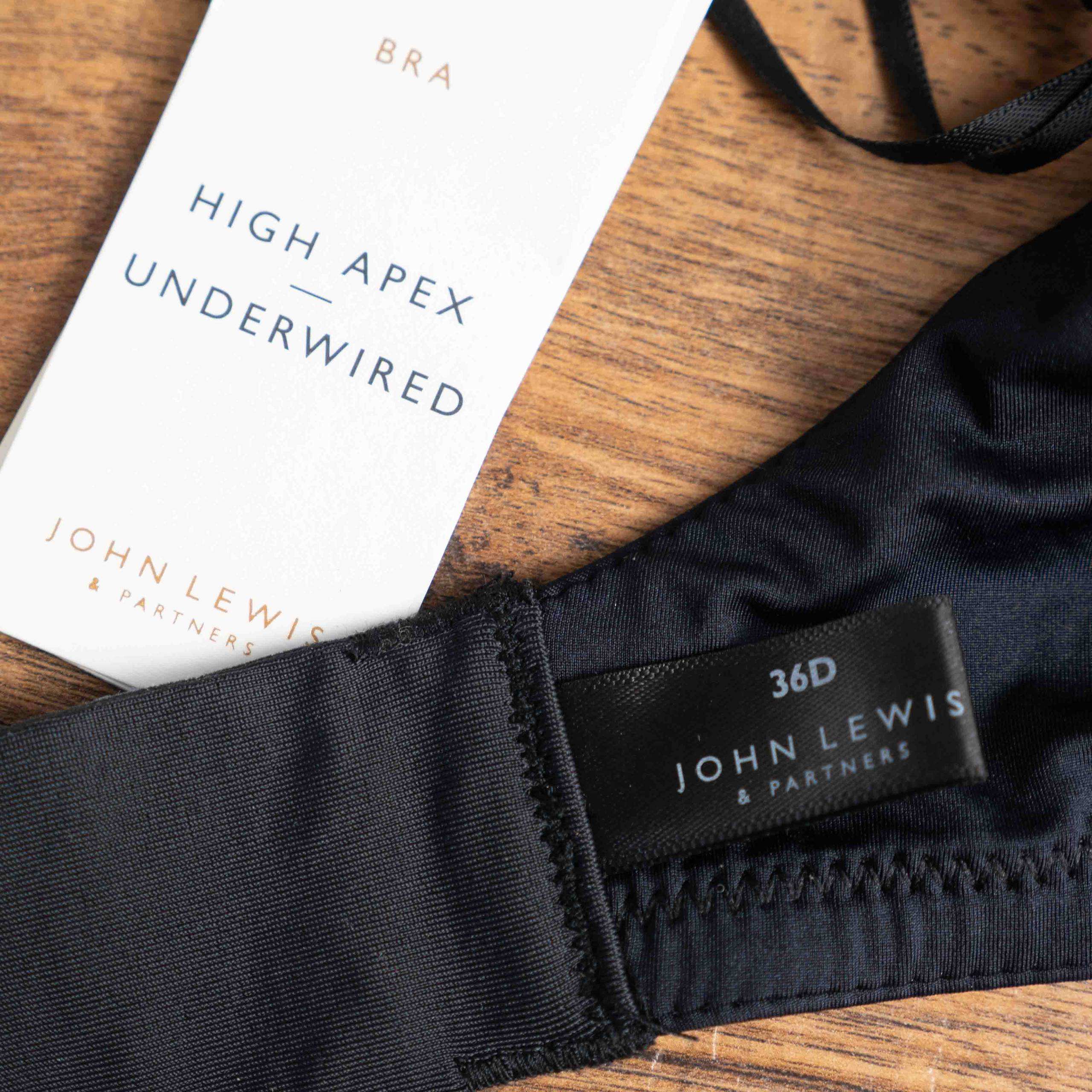 John Lewis black lace trim bra with underwire support and elegant lace detailing.