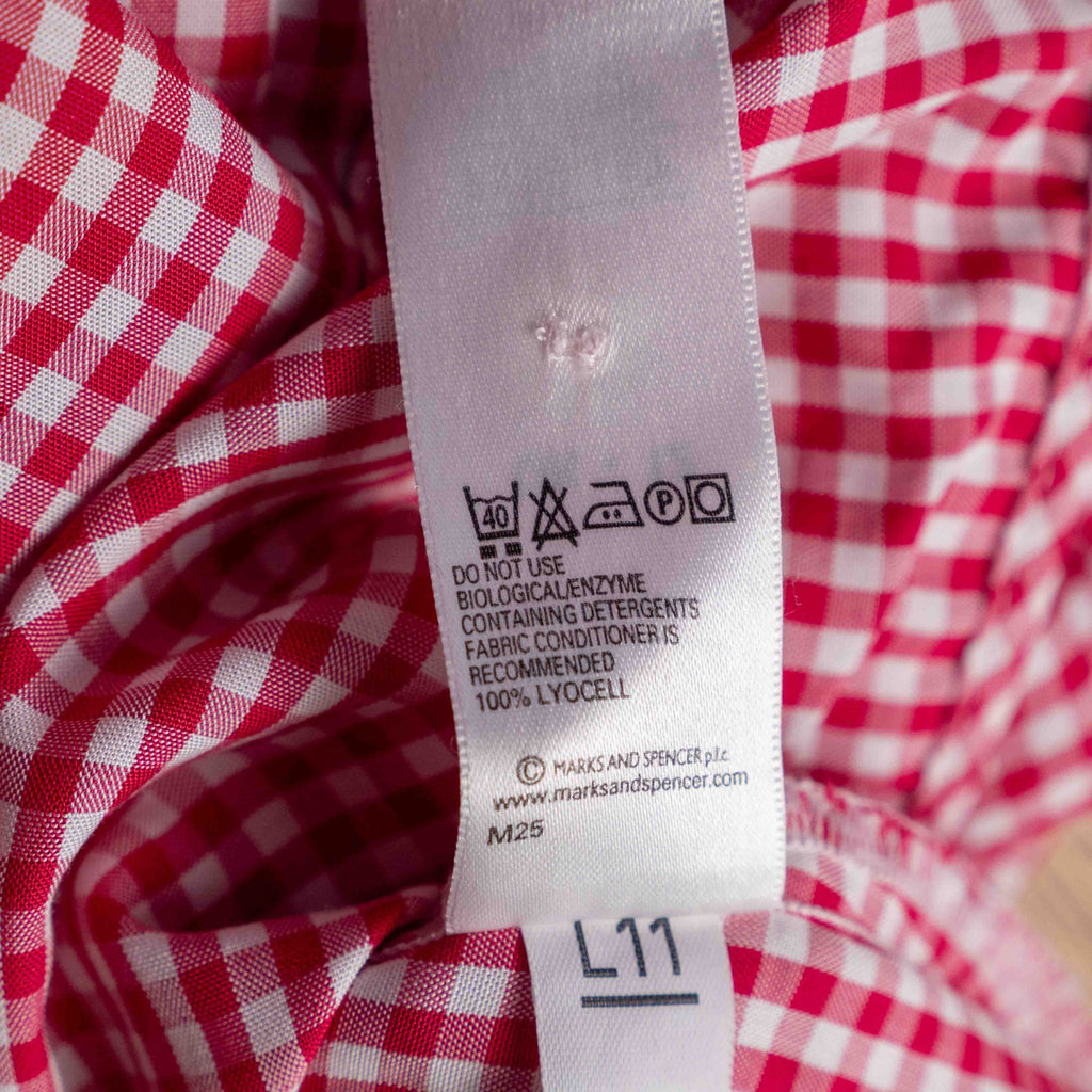 Marks & Spencer red and white gingham sleeveless shirt with classic collar and chest pocket.