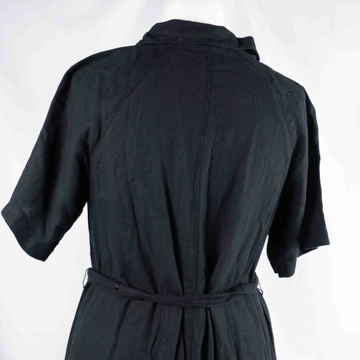 Papaya black shirt dress with button-down front, matching belt, and chest pockets.