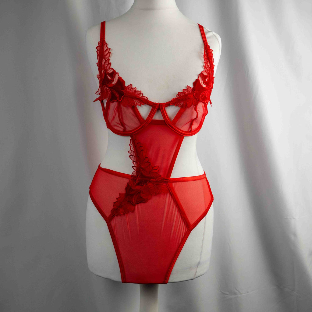 Bluebella red lace bodysuit with floral appliques and adjustable straps, underwired design.