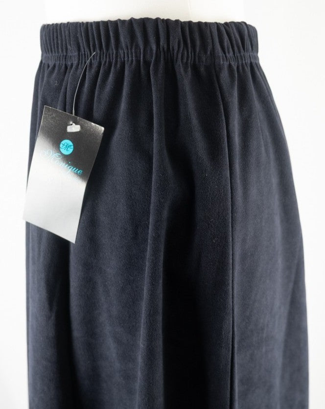 Monique Collection navy mini skirt with elasticated waistband, no patterns, 95% polyester.