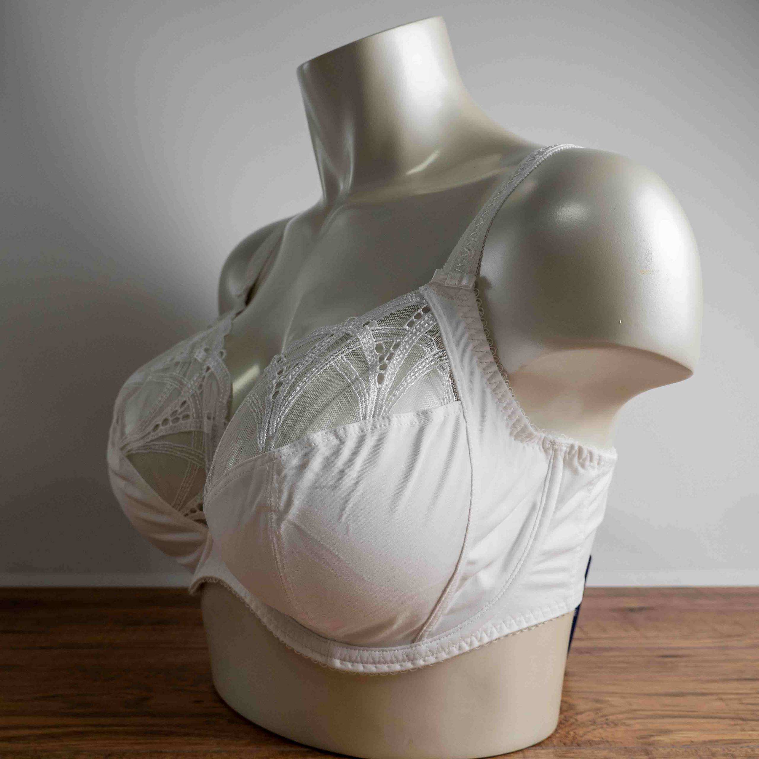 Fantasie white underwire bra with embroidered lace cups and adjustable straps.