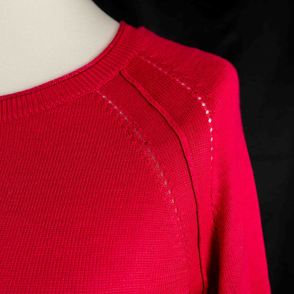 Next pink lightweight sweater with fine knit detailing on raglan sleeves and neckline.