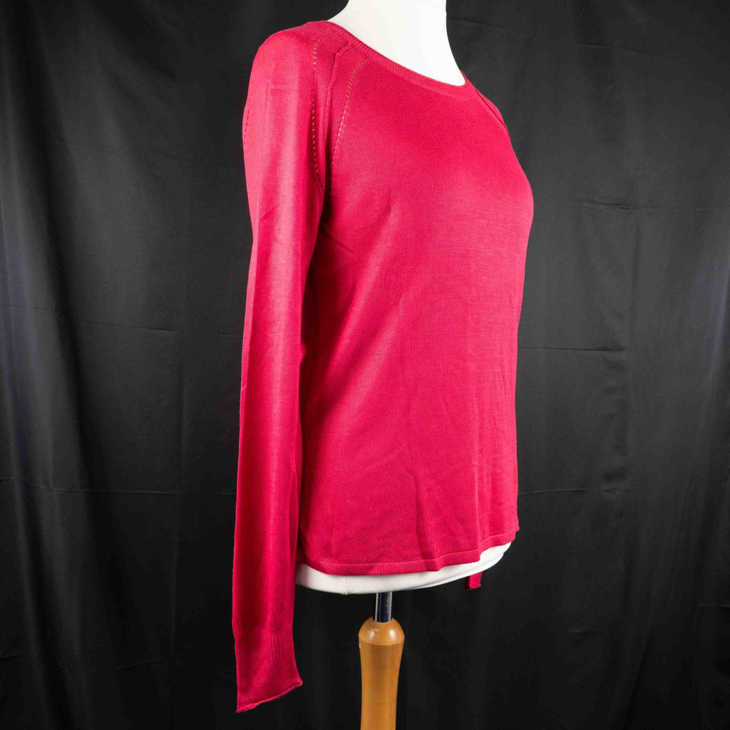 Next pink lightweight sweater with fine knit detailing on raglan sleeves and neckline.