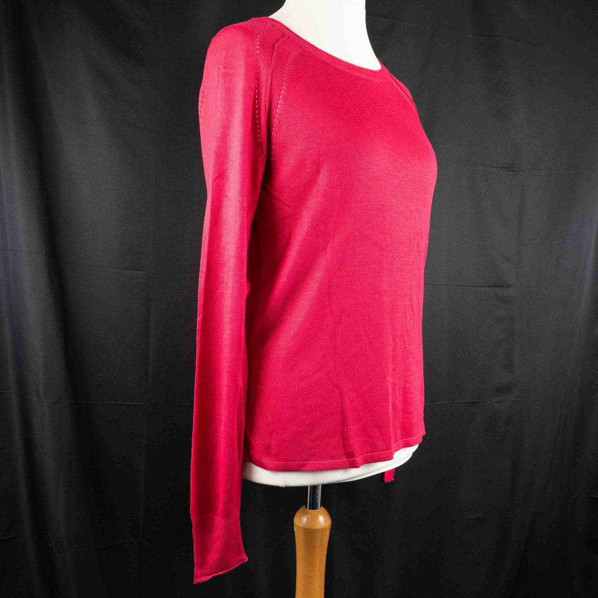 Next pink lightweight sweater with fine knit detailing on raglan sleeves and neckline.