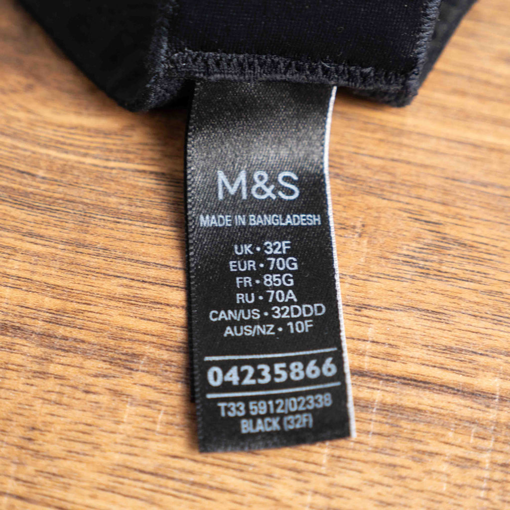 M&S black lace underwired bra with floral lace upper cups and adjustable straps.