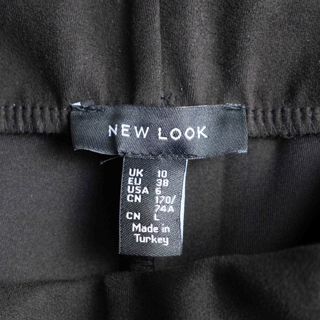 New Look black leggings with elasticated waistband and central line detail, size 10.