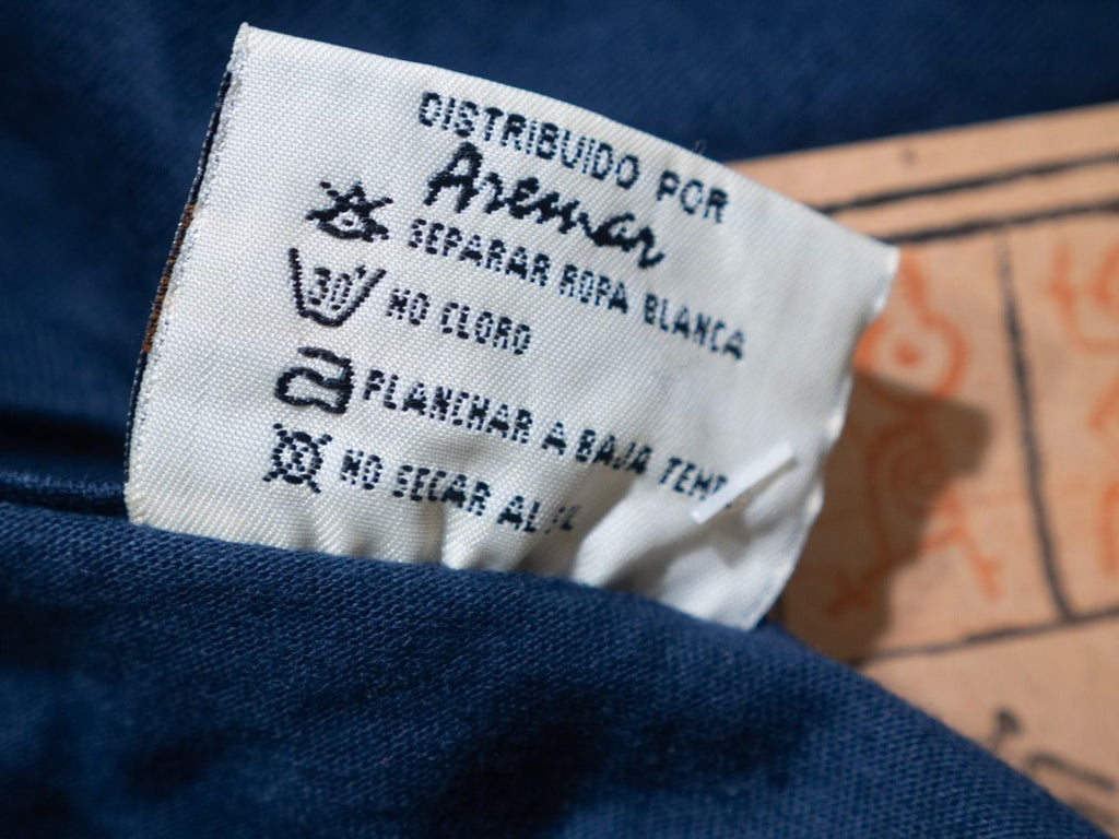 Caribbean Taino blue t-shirt featuring turtle print design on front, short sleeves.