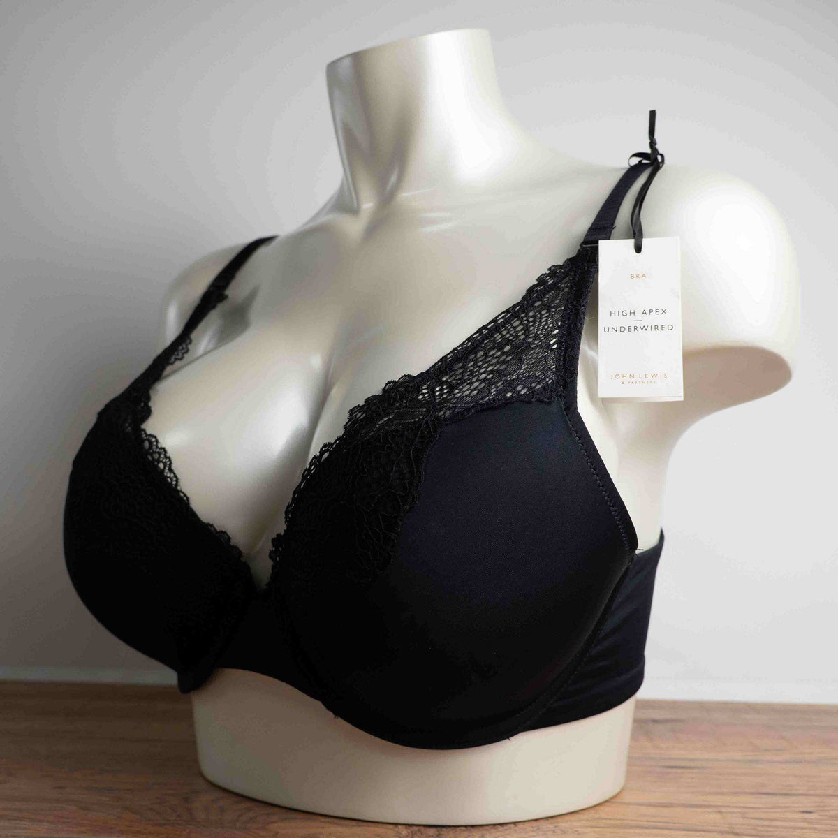 John Lewis black lace trim bra with underwire support and elegant lace detailing.