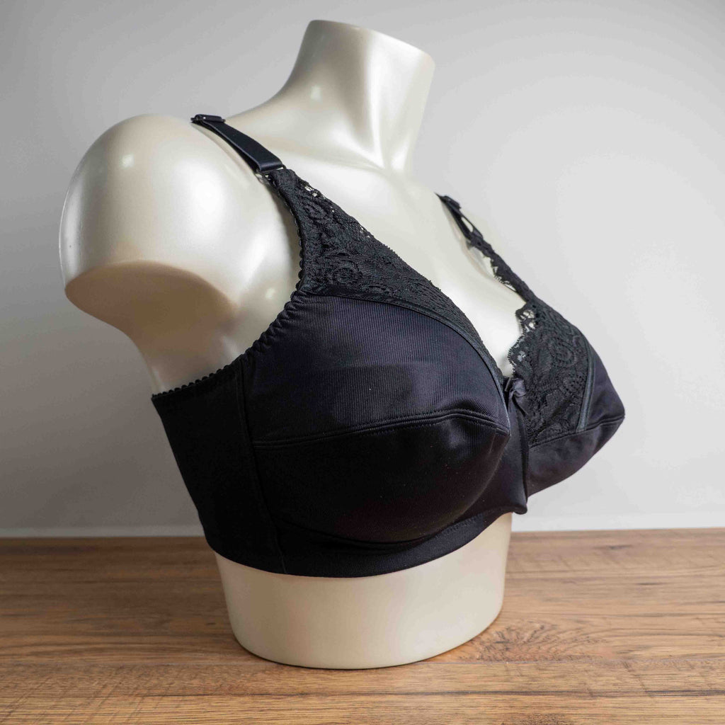 Anonymous black lace bra with soft cups and adjustable straps, brand new with tags.