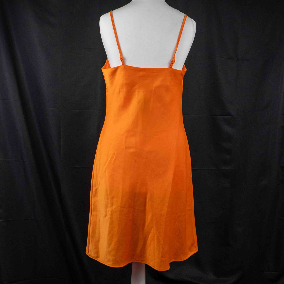 Primark orange slip dress with adjustable spaghetti straps and cowl neckline.