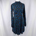New Look black dress with blue floral print, ruffled high neckline, long sleeves.