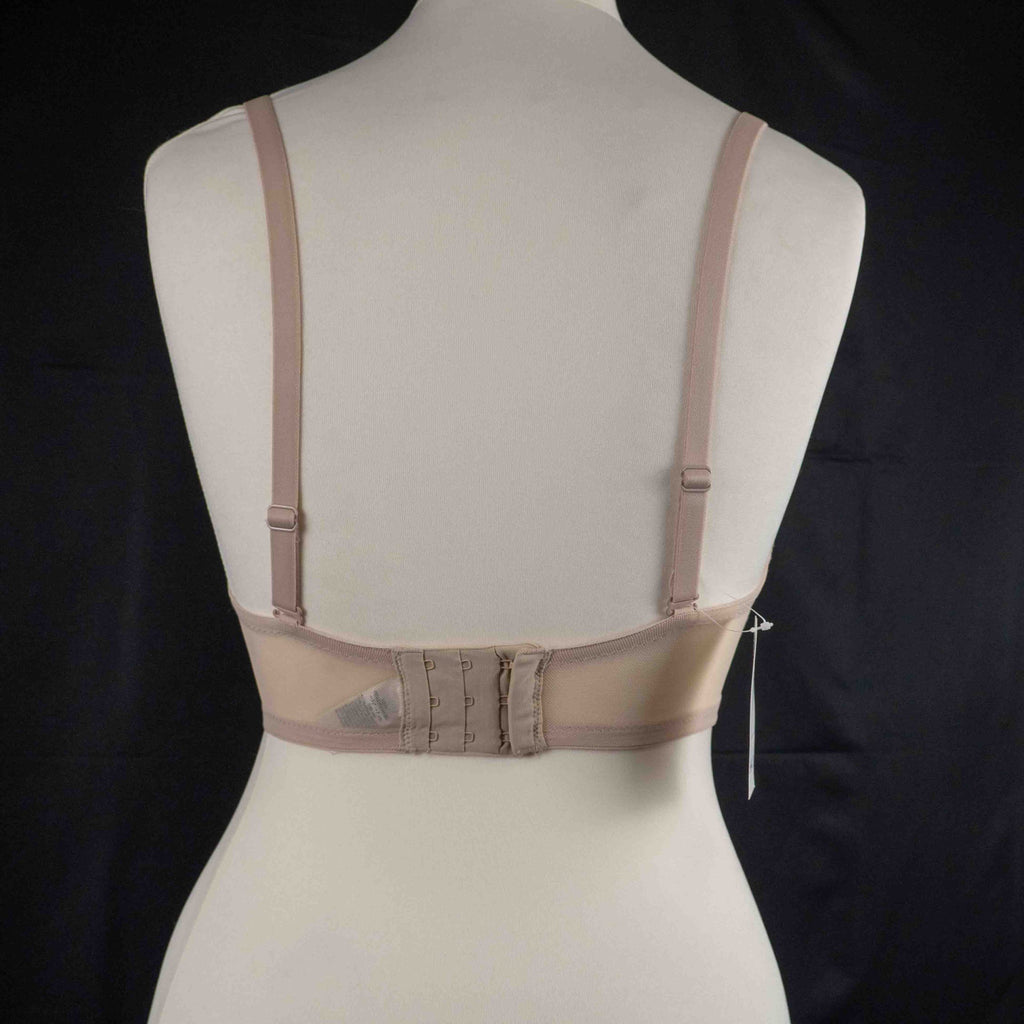 Marks and Spencer beige padded underwired bra with floral lace detail and decorative bow.