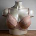 Wacoal dusty pink underwired bra with delicate lace detailing and adjustable straps.