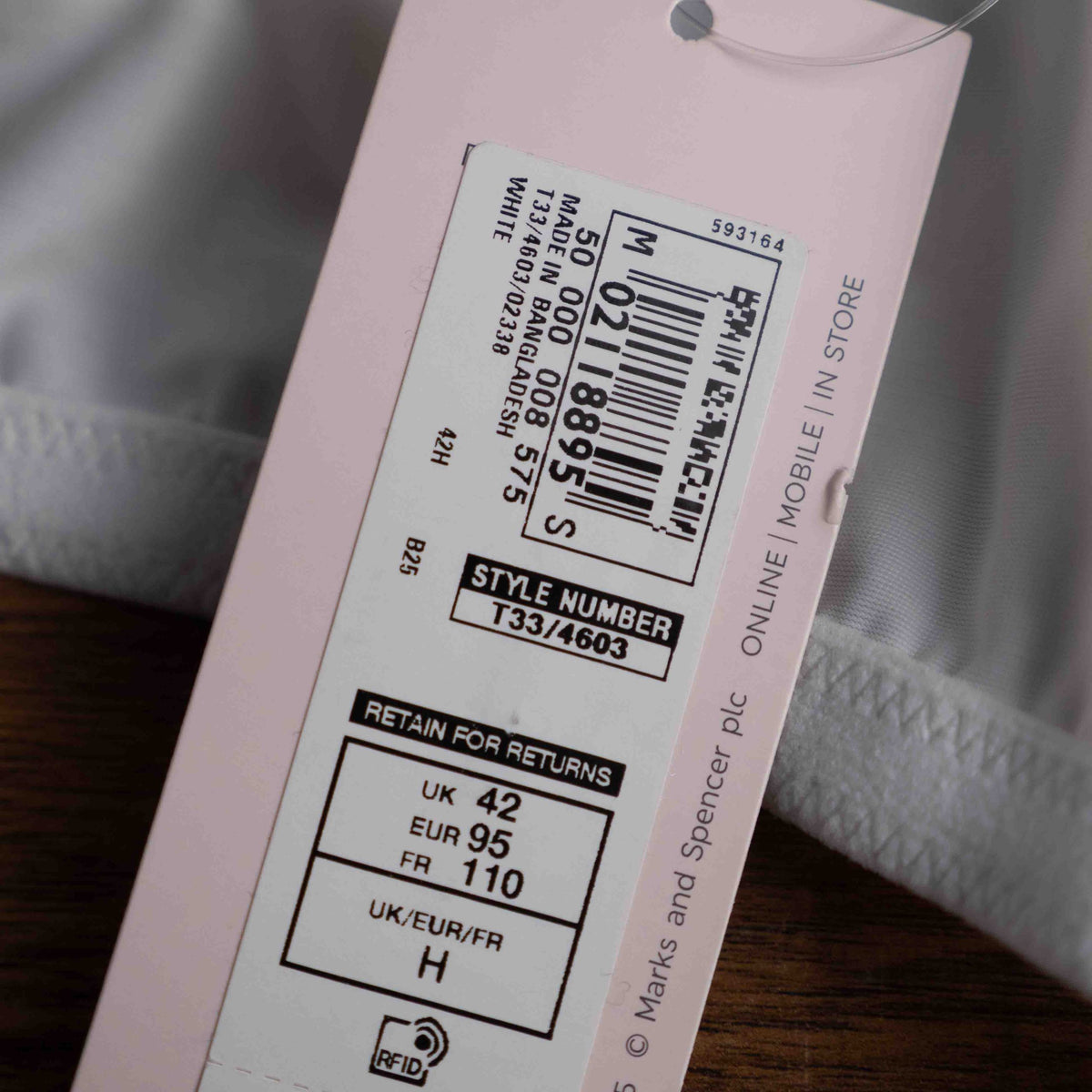 Marks & Spencer white full cup bra with lace design and underwire support.