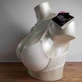 After Eden cream underwire bra with lace detail and original tags attached.