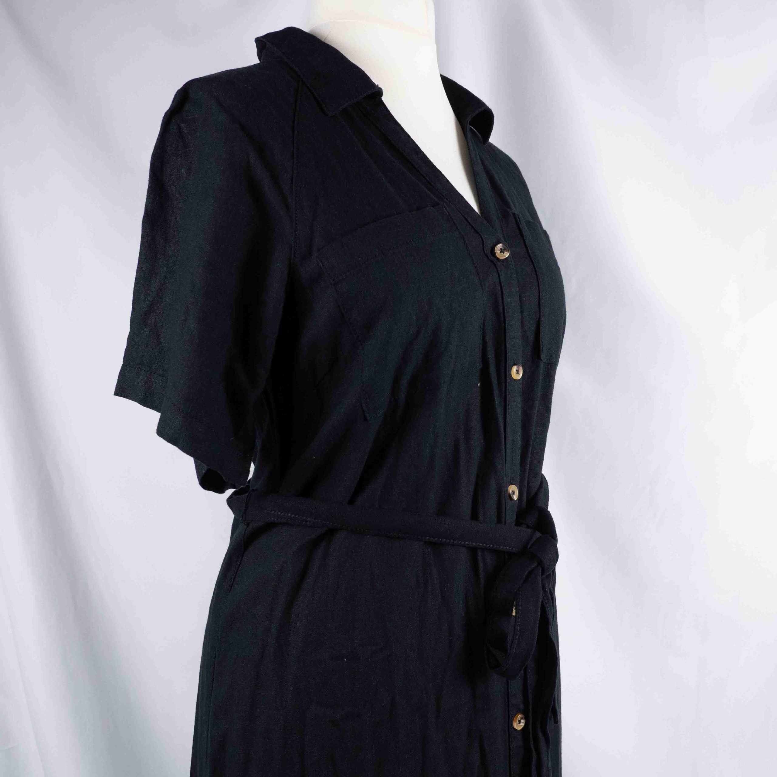 Papaya black shirt dress with button-down front, matching belt, and chest pockets.