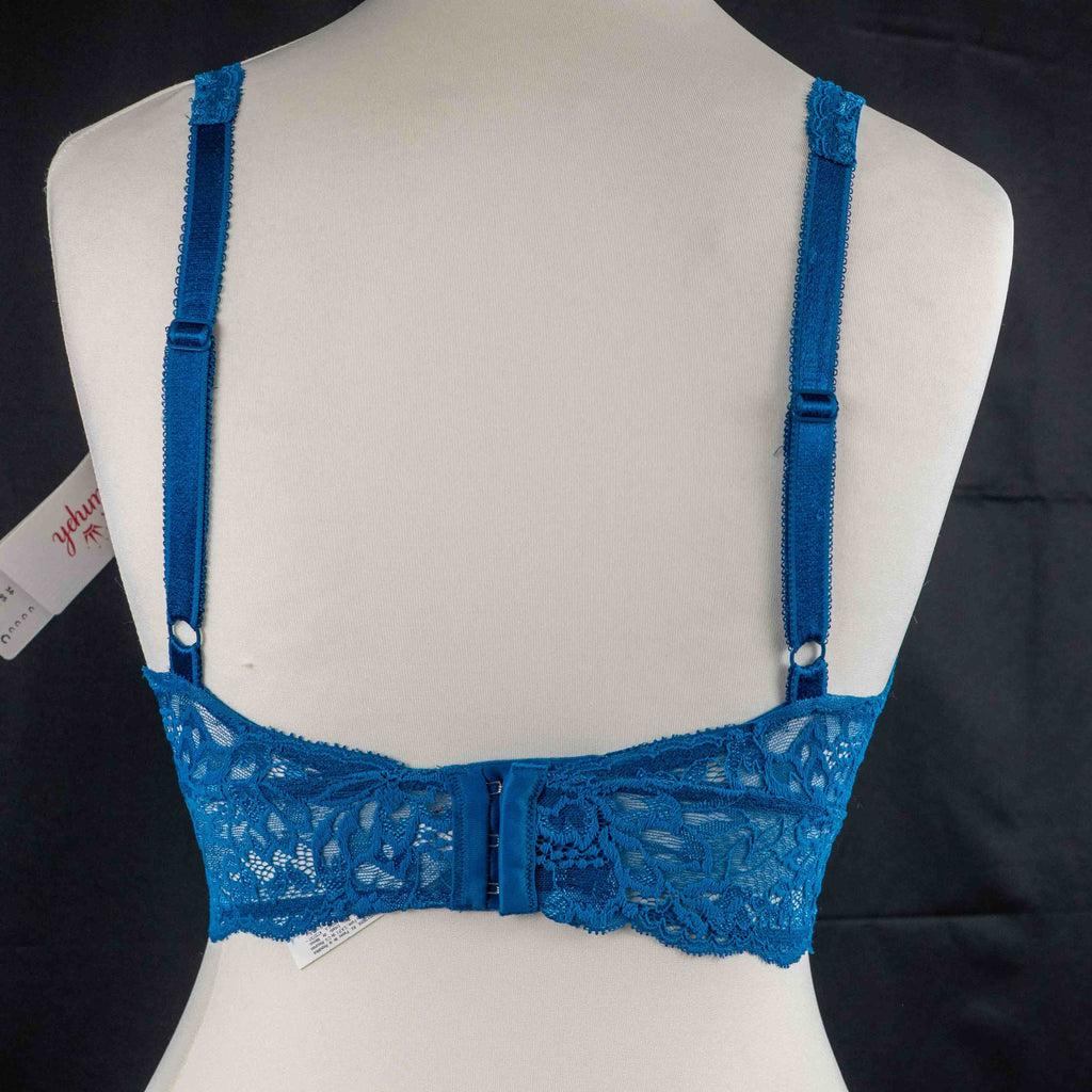 Triumph blue lace underwired bra with floral patterns and small bow detail.