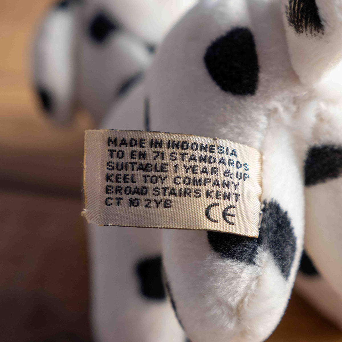 Keel Toy Company Dalmatian stuffed animal white with black spots, soft plush material.