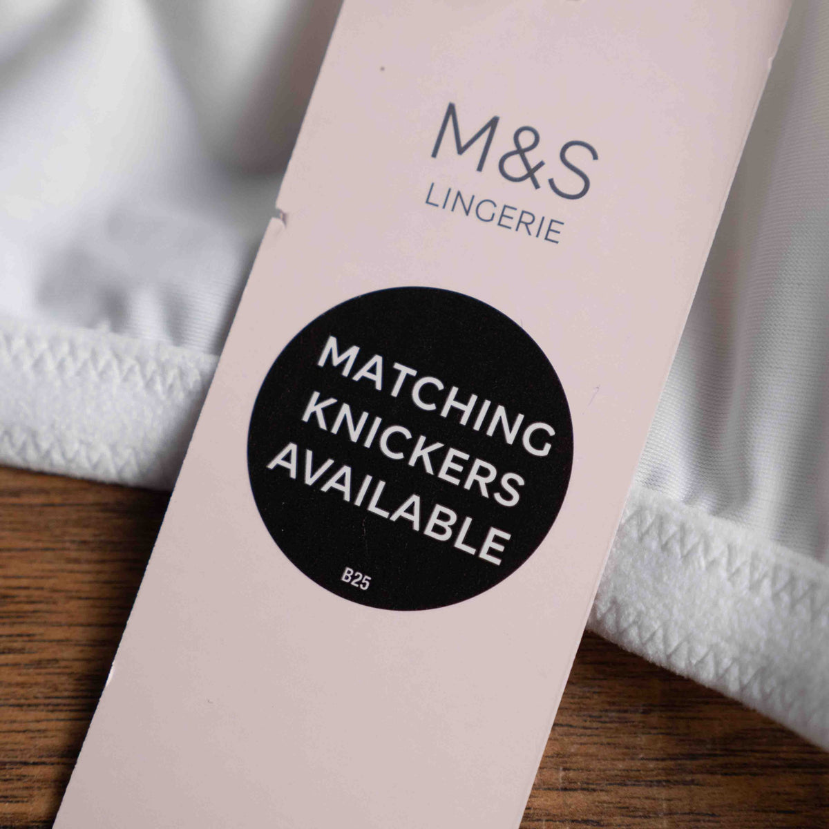 Marks & Spencer white full cup bra with lace design and underwire support.