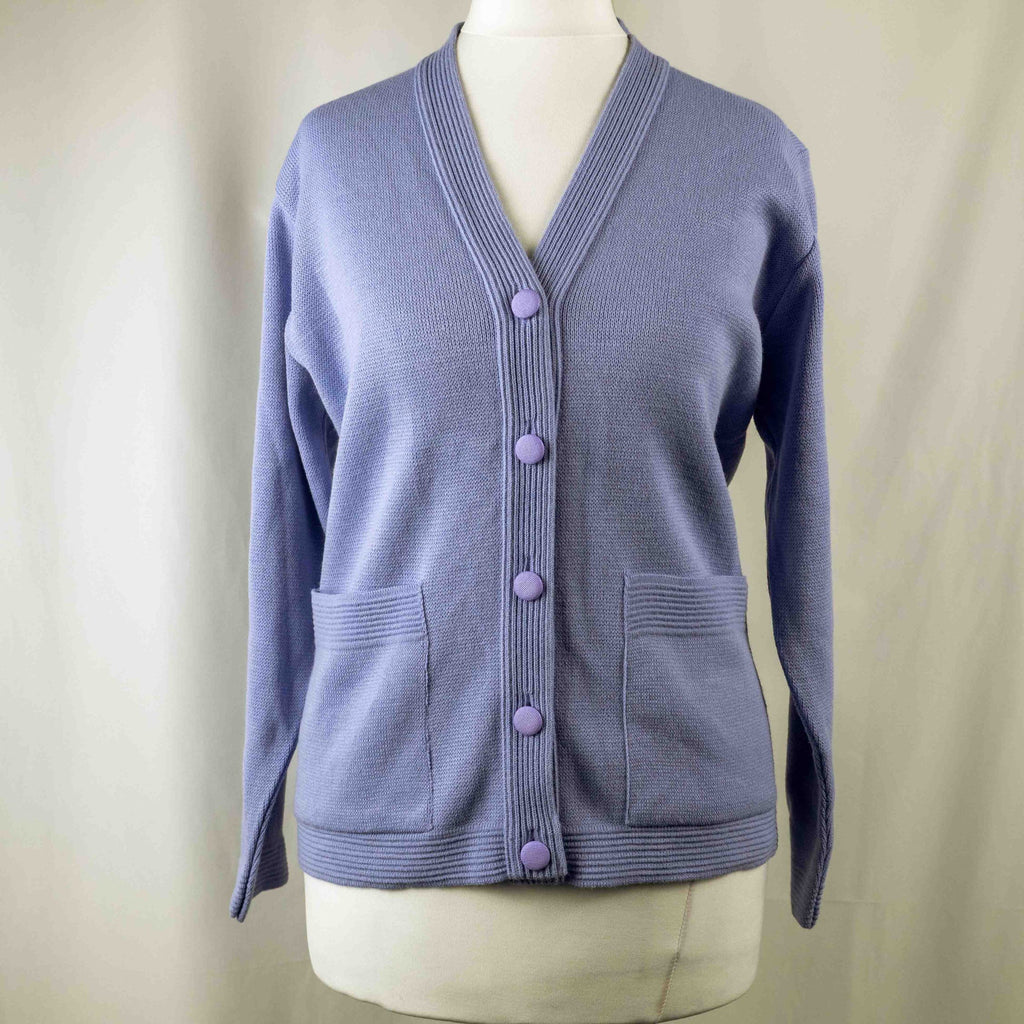 Care lilac cardigan with V-neck, five buttons, two pockets, ribbed trim.