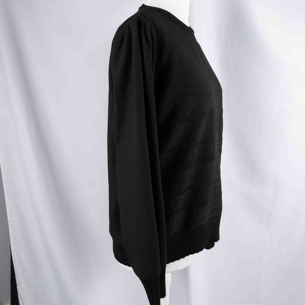 Unbranded black textured knit jumper with relaxed fit and no visible flaws.