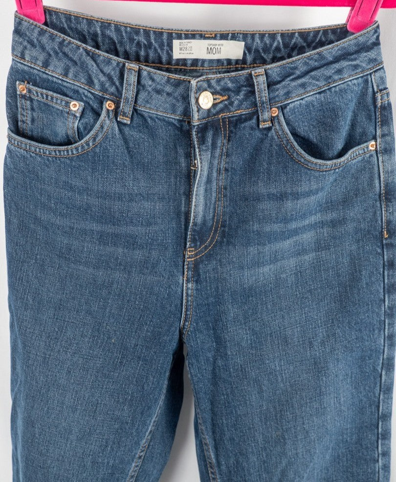 Topshop blue mom jeans with four pockets and belt loops, 100% cotton.