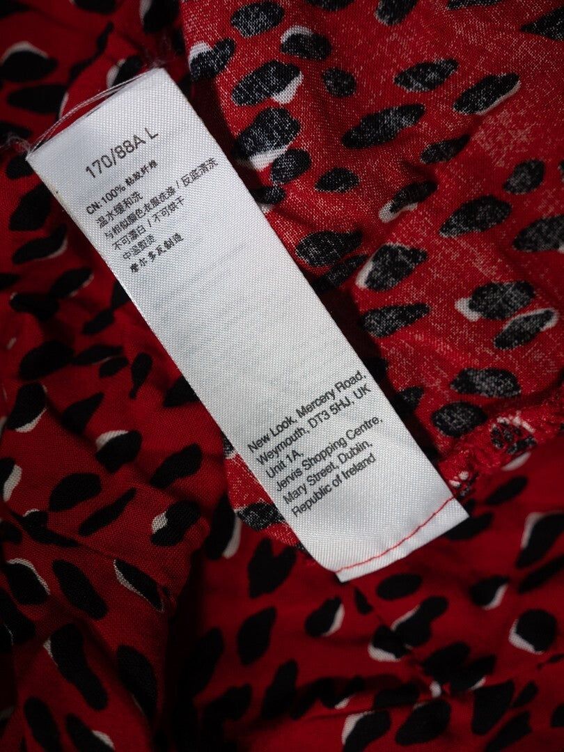 New Look red blouse with black accents, high neck, single button, 100% viscose.