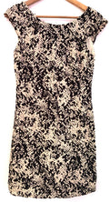 Warehouse black and white patterned shift dress, sleeveless, round neck, back zip.