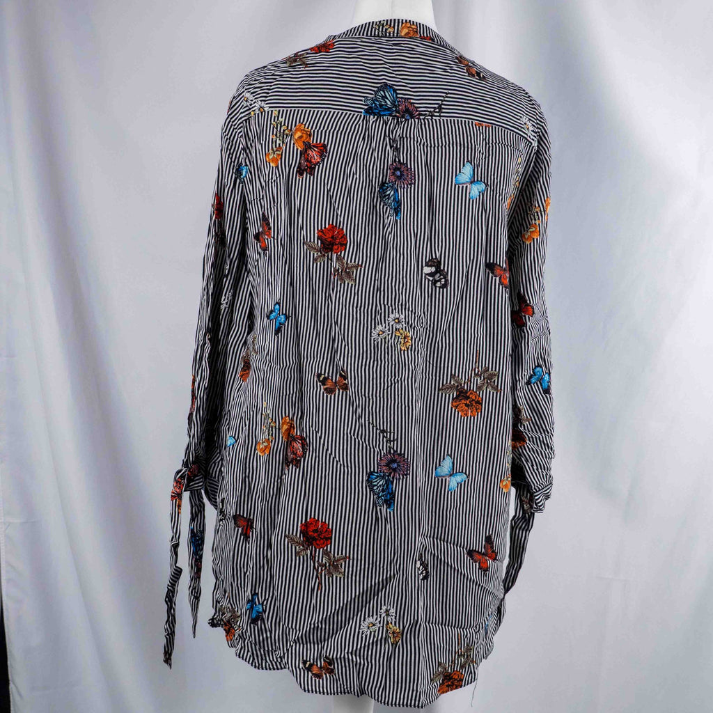 Dorothy Perkins black and white striped blouse with colourful butterfly print and tie cuffs.