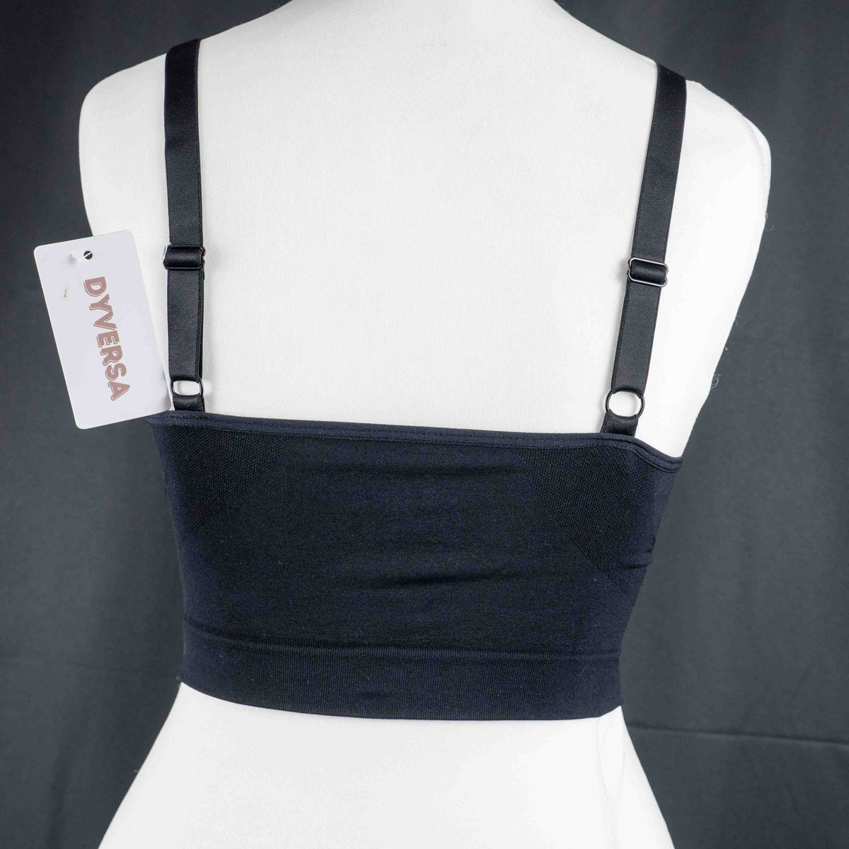 Dyversa black seamless bra with ruched center detail and adjustable straps.