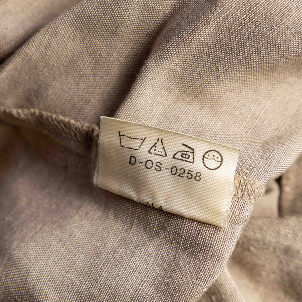 Jaeger beige linen tunic blouse with wooden buttons and back vent detail.
