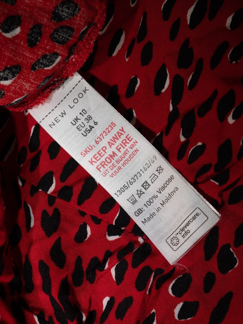 New Look red blouse with black accents, high neck, single button, 100% viscose.
