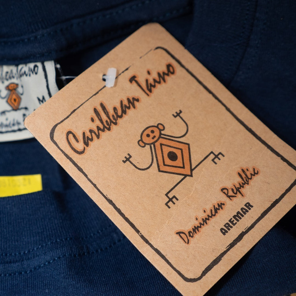 Caribbean Taino blue t-shirt featuring turtle print design on front, short sleeves.