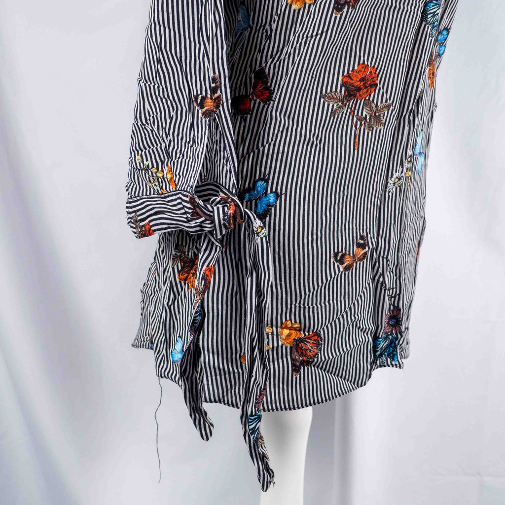 Dorothy Perkins black and white striped blouse with colourful butterfly print and tie cuffs.