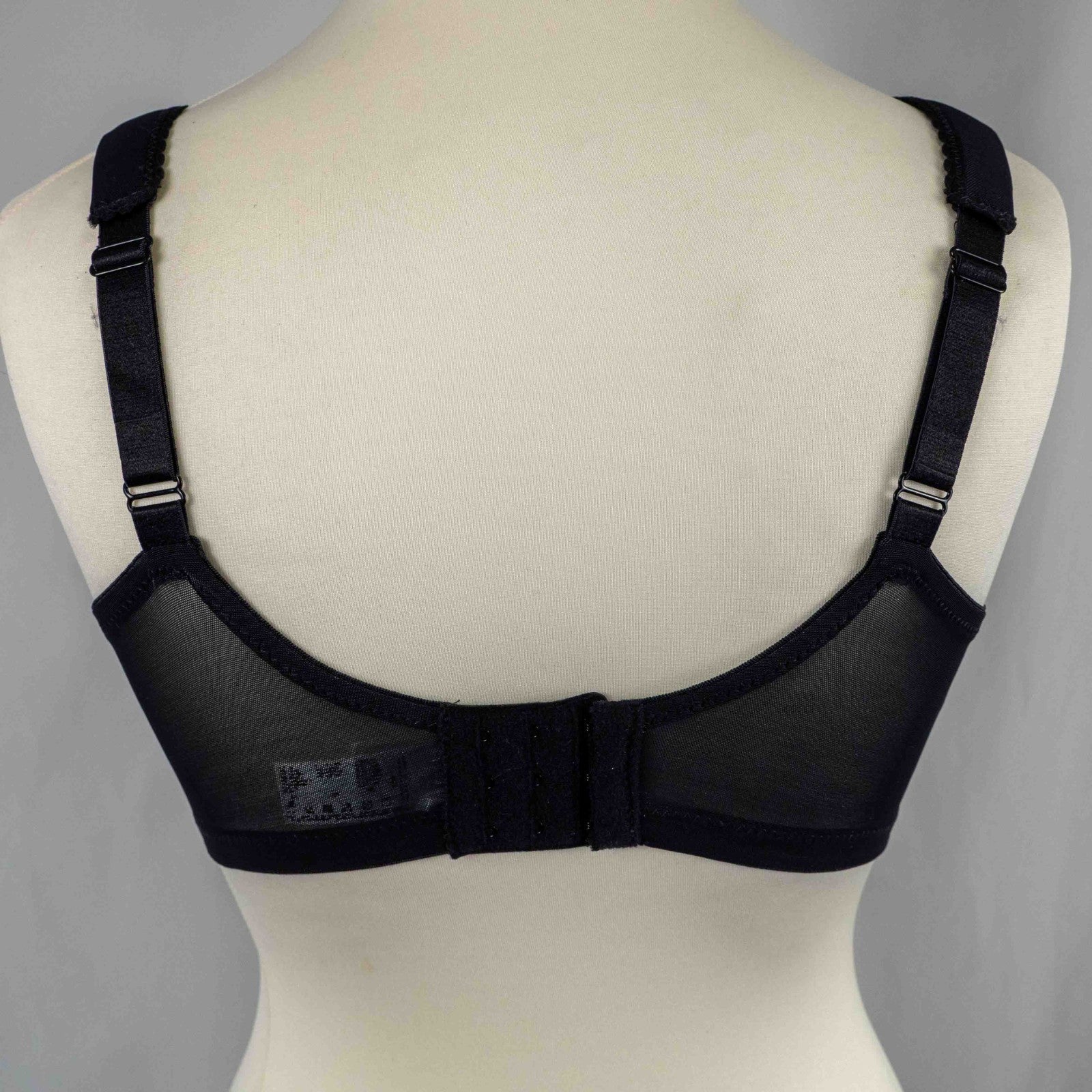 Glamorise black floral bra with pink and white pattern, adjustable straps, non-padded design.