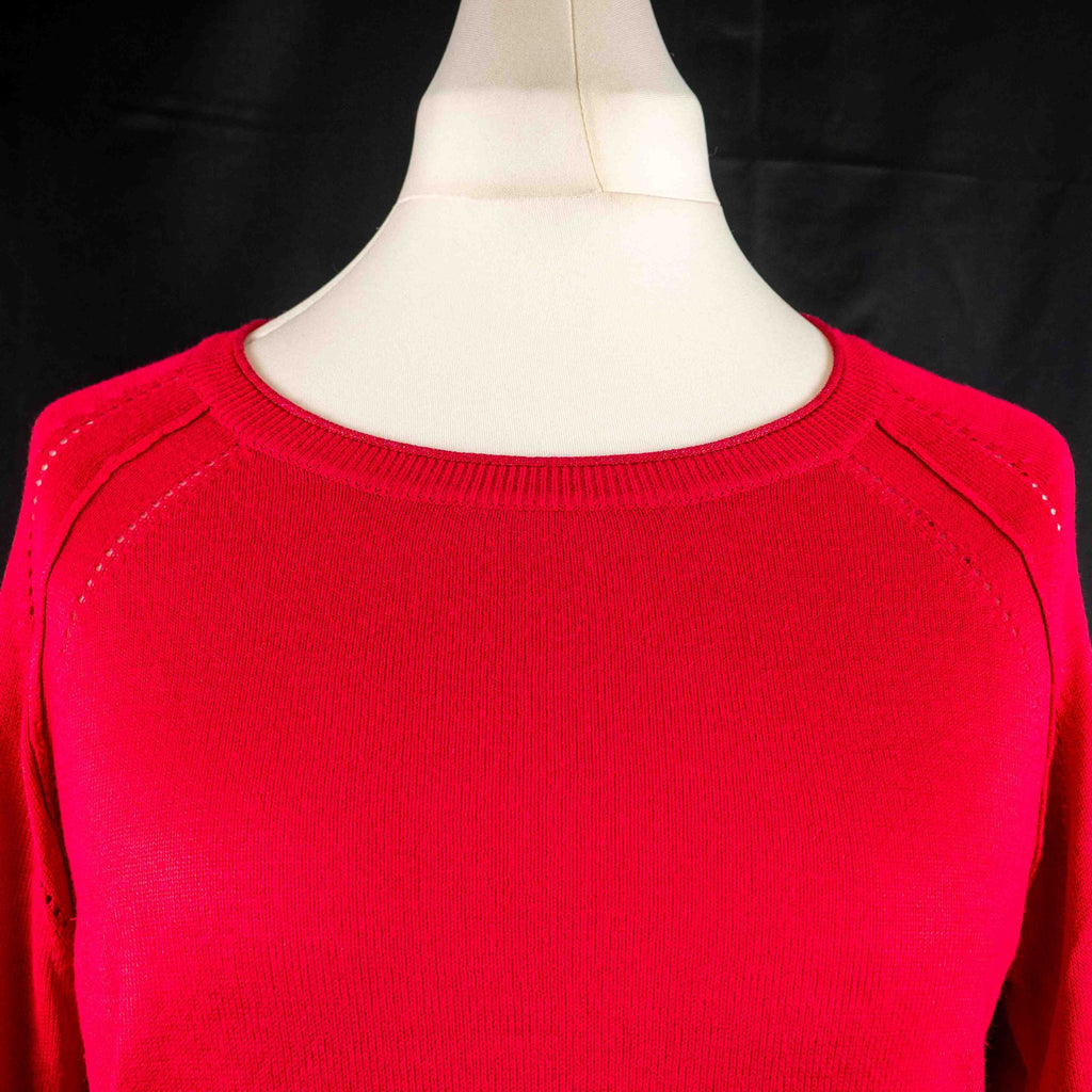 Next pink lightweight sweater with fine knit detailing on raglan sleeves and neckline.
