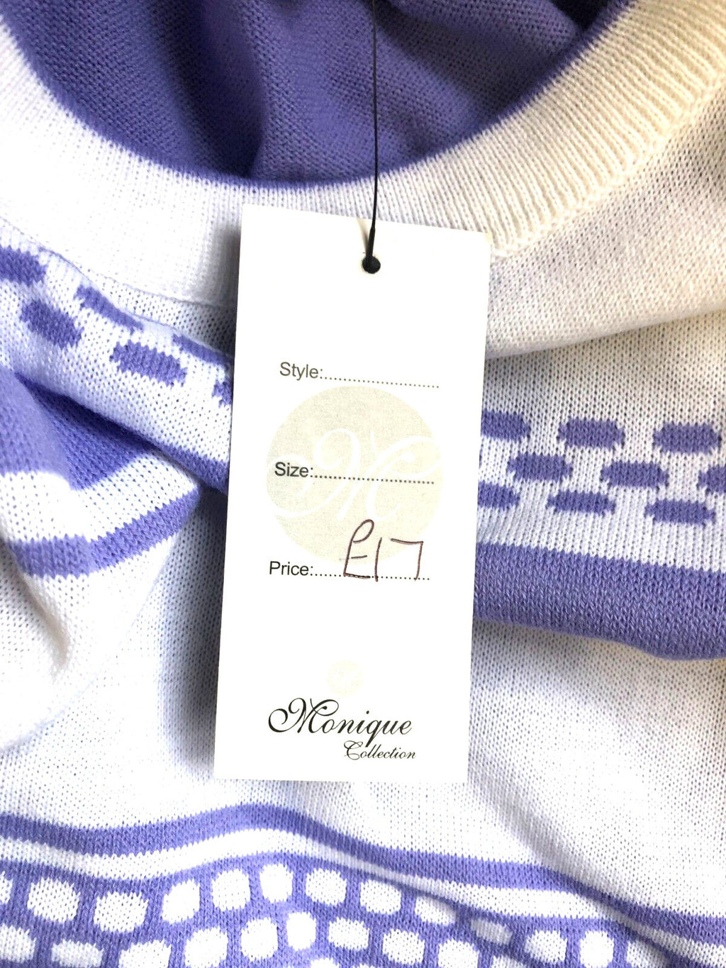 Monique Collection purple casual t-shirt with white pattern and round neck, 100% acrylic.