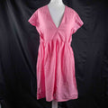 Papaya pink casual dress with embroidered floral patterns and flutter sleeves.