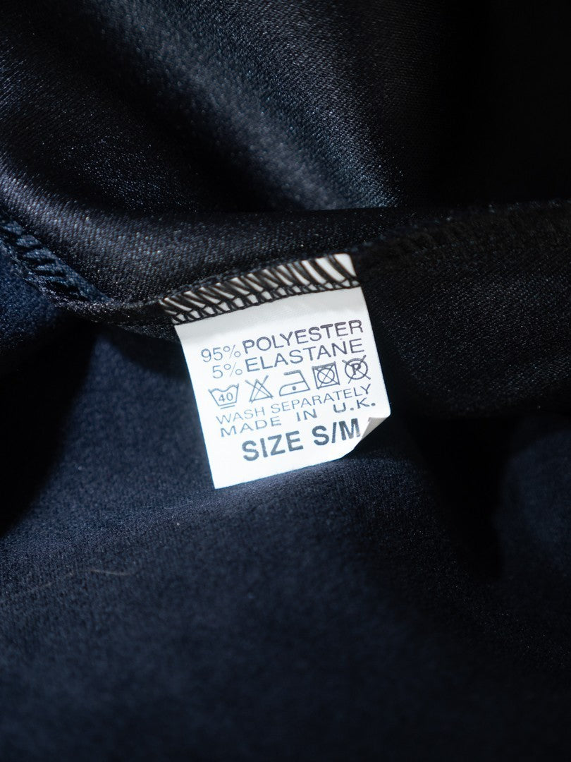 Monique Collection navy mini skirt with elasticated waistband, no patterns, 95% polyester.