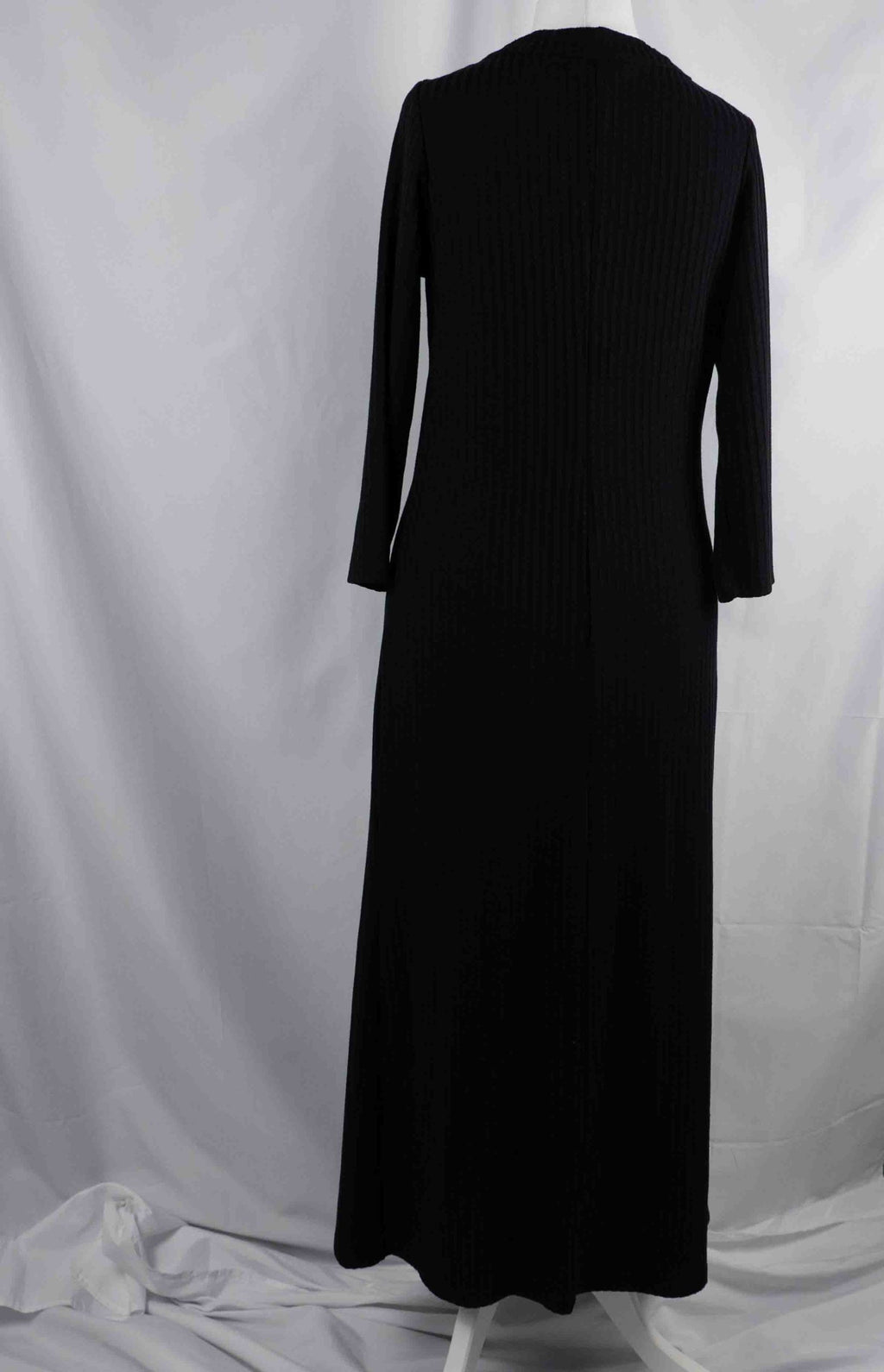 Unbranded black ribbed maxi dress with V neckline and three decorative front buttons.