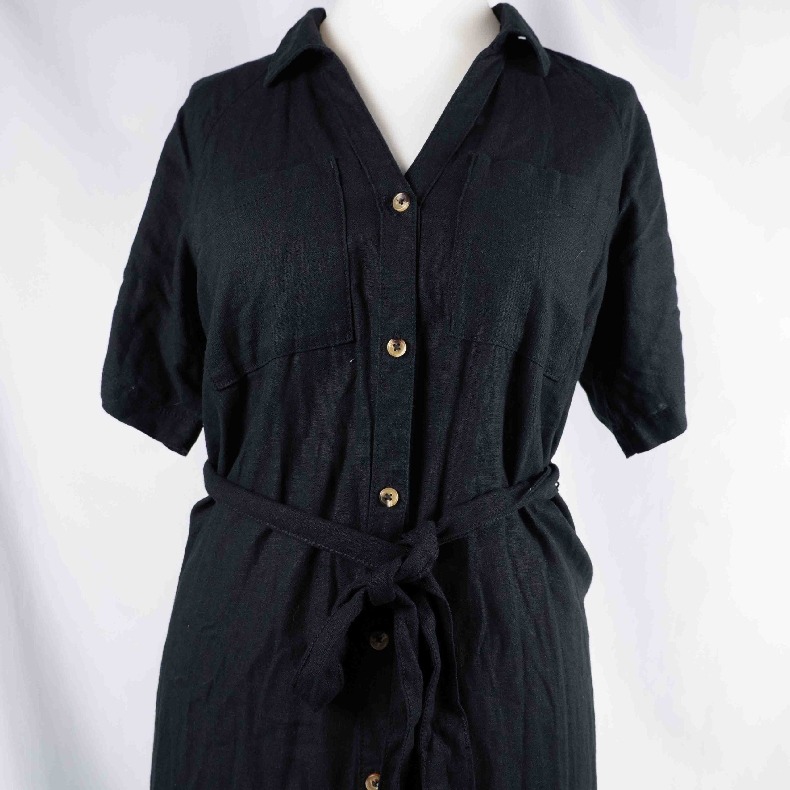 Papaya black shirt dress with button-down front, matching belt, and chest pockets.