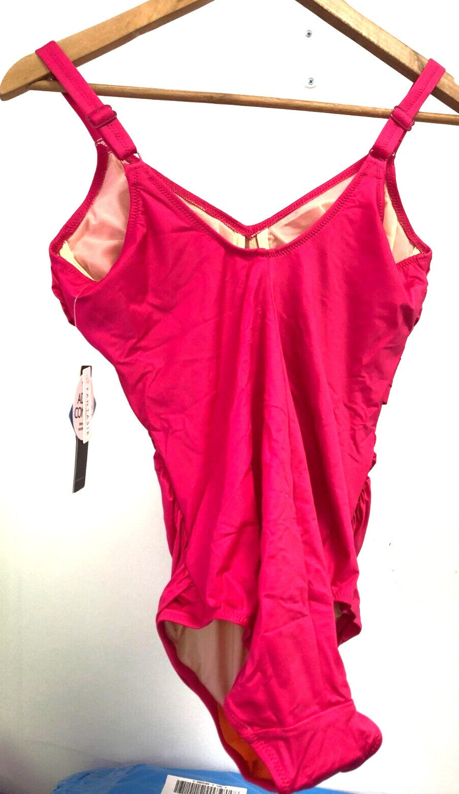 Fantasie pink one-piece swimsuit twist front underwired full cup with gathered sides.